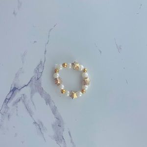 Super cute pearl and gold beated rings.